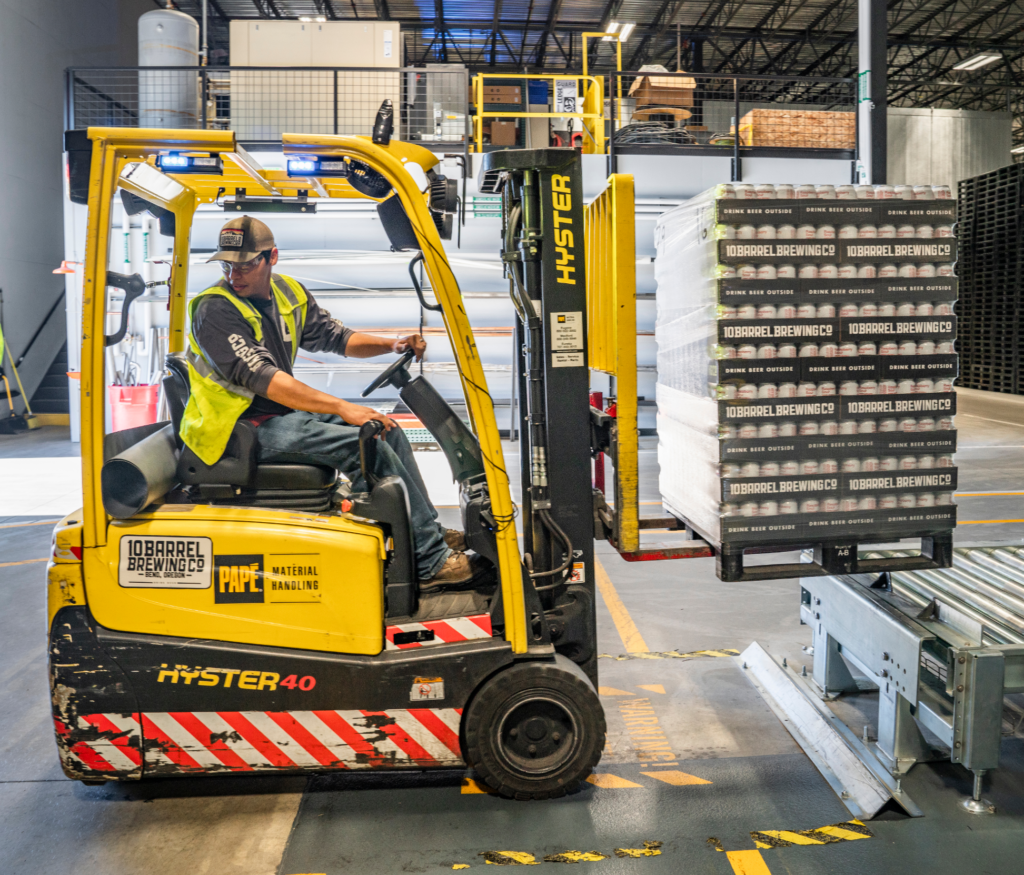 Person-Using-Forklift-for-Pallet-Disposal-Work